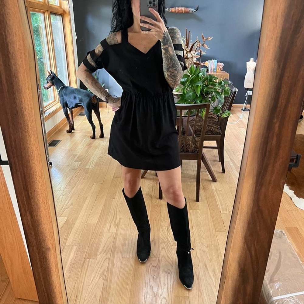 Cinched dress with cutout details and pockets